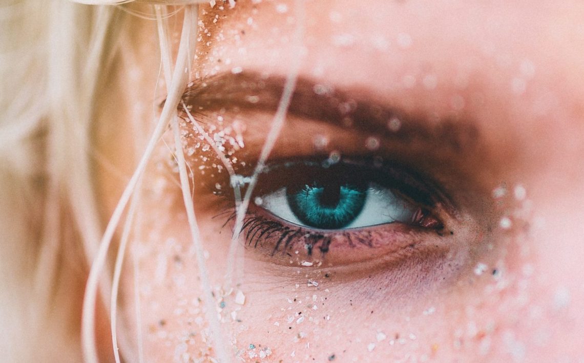 closeup view of woman with green eyes